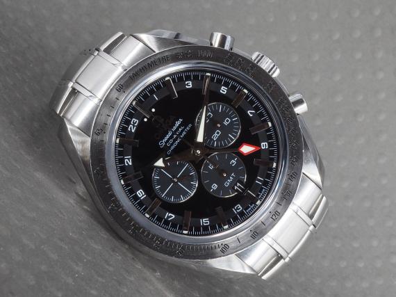 omega speedmaster broad arrow gmt